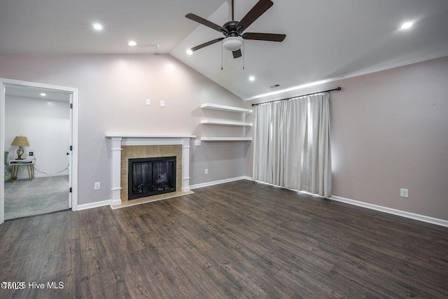 82 Mamie Rd, Benson, NC 27504 - unfurnished living room with ceiling fan, recessed lighting, a fireplace, wood finished floors, and lofted ceiling