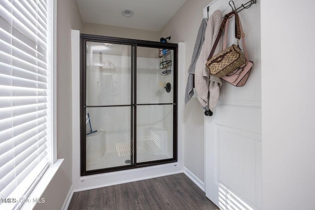 82 Mamie Rd, Benson, NC 27504 - bathroom featuring a shower stall and wood finished floors