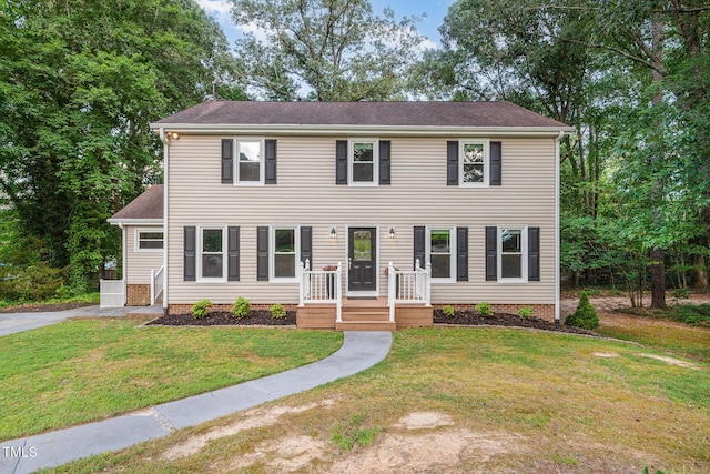 5900 Holly Dr, Raleigh, NC 27616 - colonial-style house with a front yard