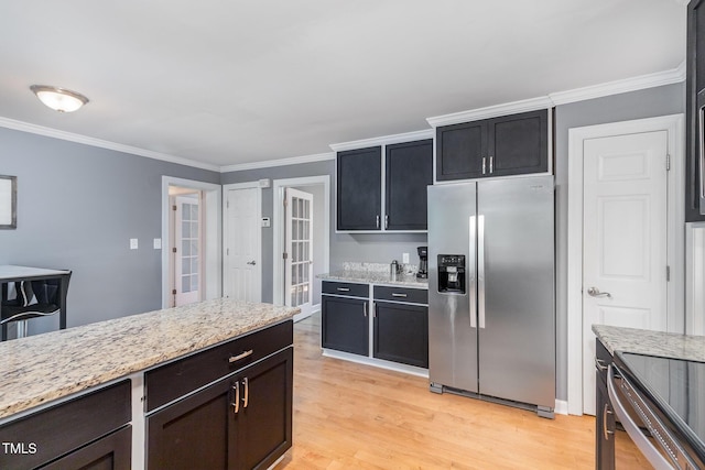 5900 Holly Dr, Raleigh, NC 27616 - kitchen featuring stainless steel fridge with ice dispenser, light wood-style flooring, ornamental molding, and light stone countertops