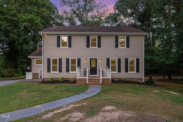 5900 Holly Dr, Raleigh, NC 27616 - colonial-style house with a front yard