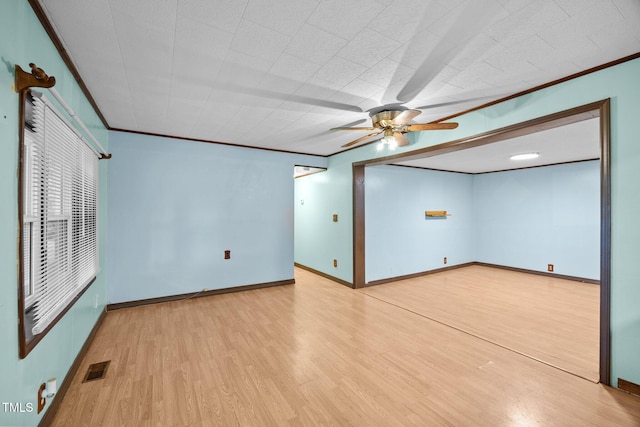 7595 Clayton Blvd Unit B, Clayton, NC 27520 - empty room featuring wood finished floors, ceiling fan, and crown molding