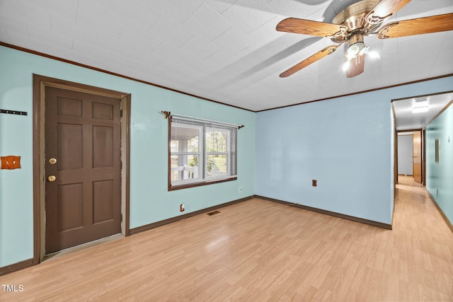 7595 Clayton Blvd Unit B, Clayton, NC 27520 - unfurnished room with ornamental molding, light wood-style floors, and a ceiling fan