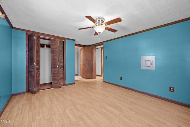 7595 Clayton Blvd Unit B, Clayton, NC 27520 - unfurnished bedroom with wood finished floors, crown molding, a closet, and a ceiling fan