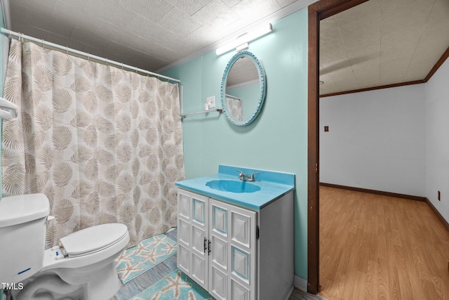 7595 Clayton Blvd Unit B, Clayton, NC 27520 - full bath featuring crown molding, vanity, wood finished floors, and a shower with shower curtain