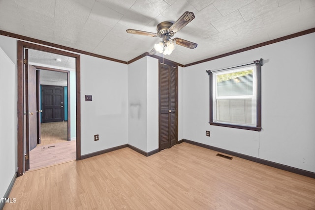 7595 Clayton Blvd Unit B, Clayton, NC 27520 - spare room featuring light wood-type flooring, ornamental molding, and a ceiling fan