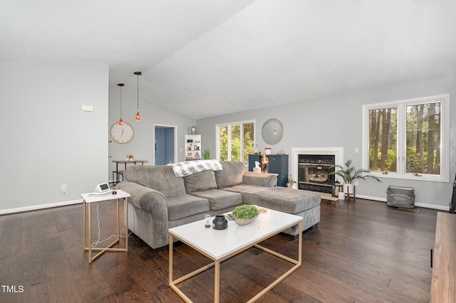 6 Driving Range Rd, Pinehurst, NC 28374 - living room with lofted ceiling, dark wood finished floors, and a fireplace with flush hearth