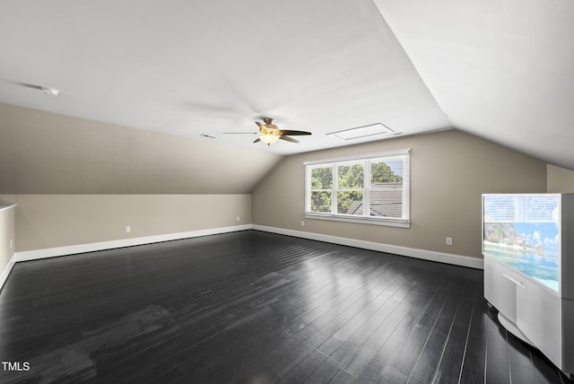 204 Edgepine Dr, Holly Springs, NC 27540 - additional living space with ceiling fan, vaulted ceiling, and dark wood-style flooring