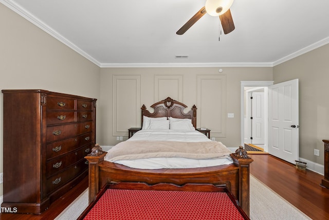 204 Edgepine Dr, Holly Springs, NC 27540 - bedroom featuring dark wood-style flooring, crown molding, and a ceiling fan
