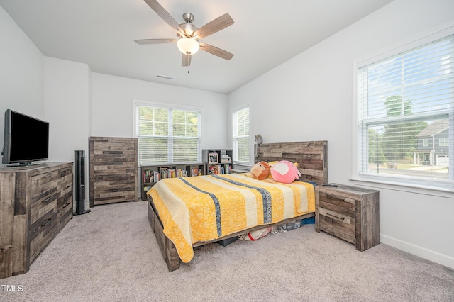 321 Conrad Ln, Wake Forest, NC 27587 - bedroom featuring carpet floors and a ceiling fan