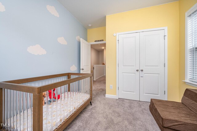 321 Conrad Ln, Wake Forest, NC 27587 - bedroom with carpet, a closet, multiple windows, and a crib