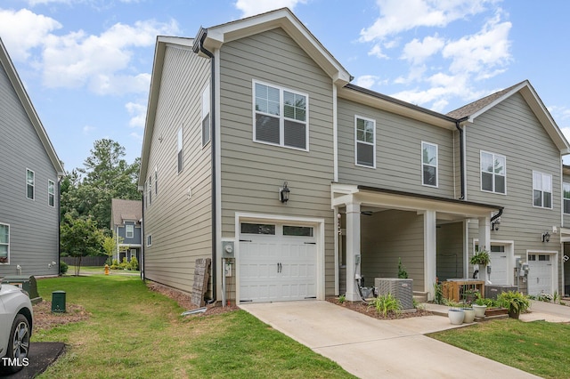 321 Conrad Ln, Wake Forest, NC 27587 - view of front of property featuring a garage, a front lawn, and concrete driveway