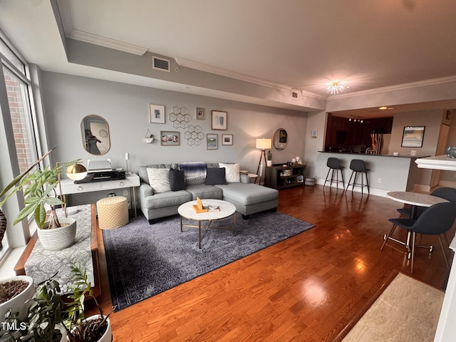 510 Glenwood Ave Unit 606, Raleigh, NC 27603 - living area featuring ornamental molding and wood finished floors