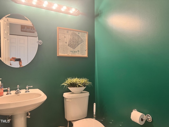 510 Glenwood Ave Unit 606, Raleigh, NC 27603 - bathroom featuring toilet and a sink