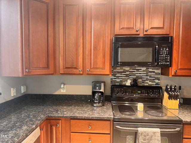 510 Glenwood Ave Unit 606, Raleigh, NC 27603 - kitchen with black microwave, electric range, white dishwasher, dark stone counters, and tasteful backsplash