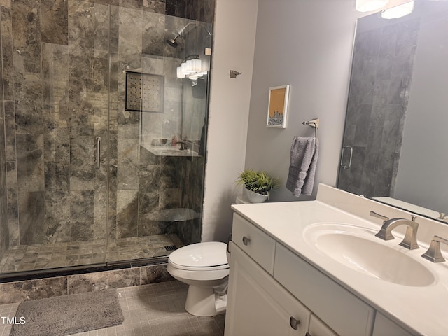 510 Glenwood Ave Unit 606, Raleigh, NC 27603 - bathroom with a stall shower, vanity, and tile patterned flooring
