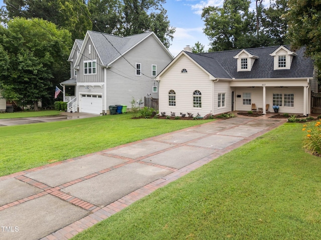 807 Edmund St, Raleigh, NC 27604 - view of front of home with concrete driveway, roof with shingles, a garage, a front lawn, and a chimney