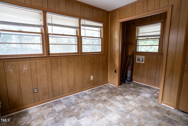 2100 Breeze Rd, Raleigh, NC 27608 - unfurnished room featuring wood walls and stone finish flooring