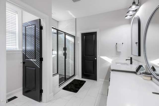 257 Rawhide Dr, Louisburg, NC 27549 - bathroom with marble look tiles, a shower stall, and double vanity