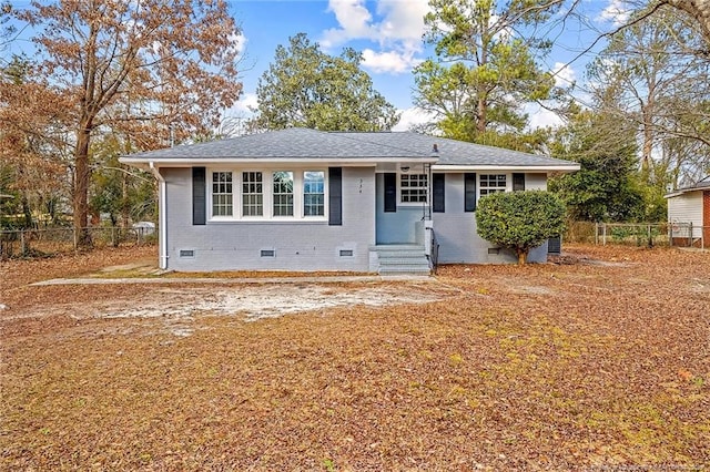 334 Richmond Dr, Fayetteville, NC 28304 - view of front of home with crawl space, entry steps, brick siding, and a shingled roof