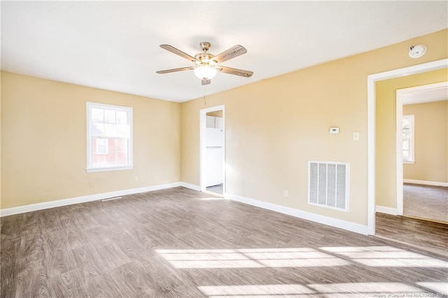 334 Richmond Dr, Fayetteville, NC 28304 - unfurnished room with a ceiling fan, a smoke detector, and wood finished floors