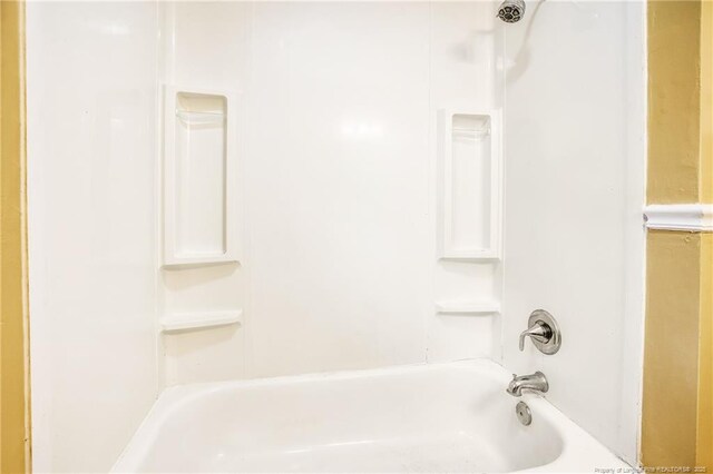 334 Richmond Dr, Fayetteville, NC 28304 - bathroom featuring washtub / shower combination