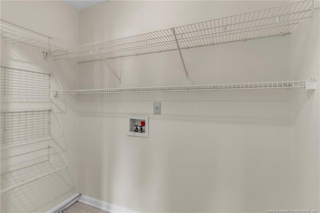 6324 Foxlake Dr, Fayetteville, NC 28314 - laundry room featuring hookup for a washing machine and baseboards