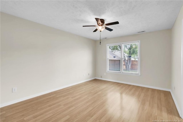 6324 Foxlake Dr, Fayetteville, NC 28314 - spare room with light wood-type flooring, a ceiling fan, and a textured ceiling