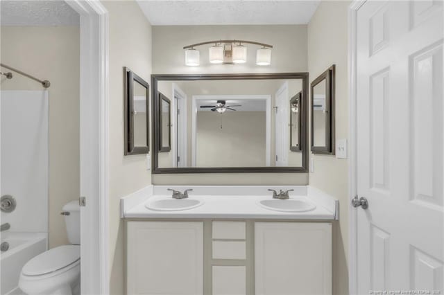 6324 Foxlake Dr, Fayetteville, NC 28314 - full bathroom featuring a ceiling fan, double vanity, tub / shower combination, and a textured ceiling