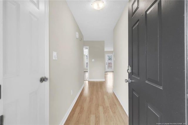 6324 Foxlake Dr, Fayetteville, NC 28314 - hallway featuring light wood-style flooring and baseboards