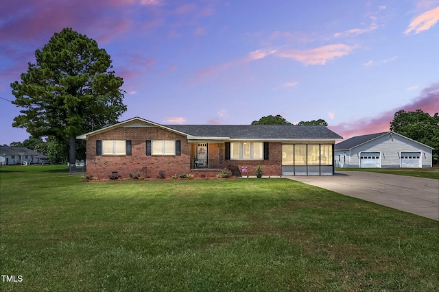 1255 NC-581, Pikeville, NC 27863 - ranch-style house with brick siding, a front lawn, and concrete driveway