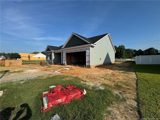 6301 Emerson Grove Ct, Stedman, NC 28391 - view of side of home with an attached garage