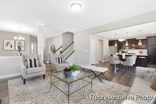 59 Curling Creek Dr Unit I285, Clayton, NC 27527 - living area featuring wood finished floors, a chandelier, stairs, and recessed lighting
