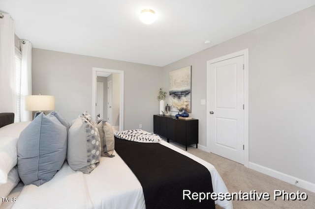 59 Curling Creek Dr Unit I285, Clayton, NC 27527 - carpeted bedroom featuring baseboards