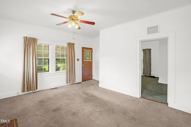 907 Morehead Ave, Durham, NC 27707 - spare room featuring carpet and a ceiling fan