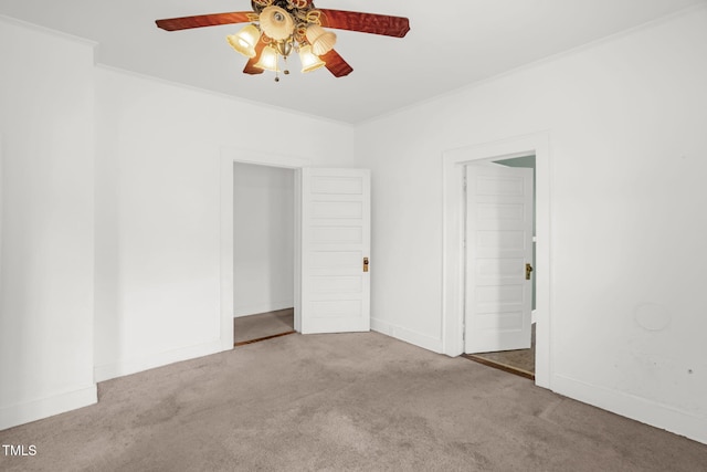 907 Morehead Ave, Durham, NC 27707 - unfurnished bedroom featuring carpet floors, crown molding, and ceiling fan