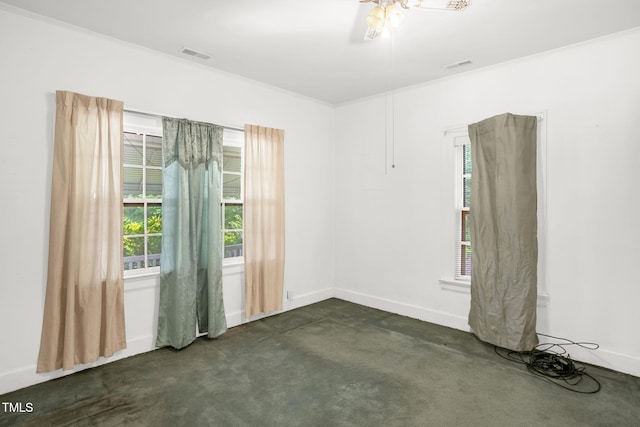 907 Morehead Ave, Durham, NC 27707 - spare room featuring crown molding, plenty of natural light, and ceiling fan