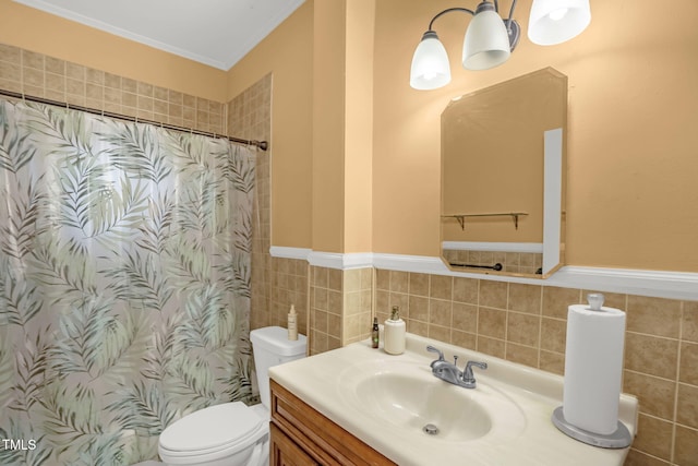 907 Morehead Ave, Durham, NC 27707 - bathroom with tile walls, vanity, curtained shower, crown molding, and wainscoting