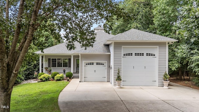 1221 Sagamore Dr, Louisburg, NC 27549 - view of front of property with roof with shingles, a garage, concrete driveway, a front lawn, and a chimney