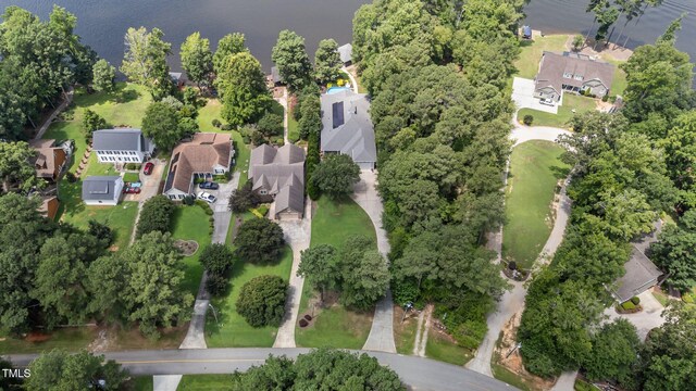 1221 Sagamore Dr, Louisburg, NC 27549 - aerial view of property and surrounding area with nearby suburban area and a nearby body of water