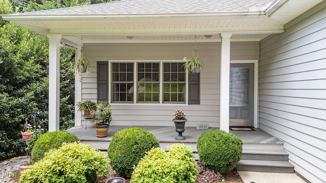 1221 Sagamore Dr, Louisburg, NC 27549 - entrance to property featuring covered porch and a shingled roof