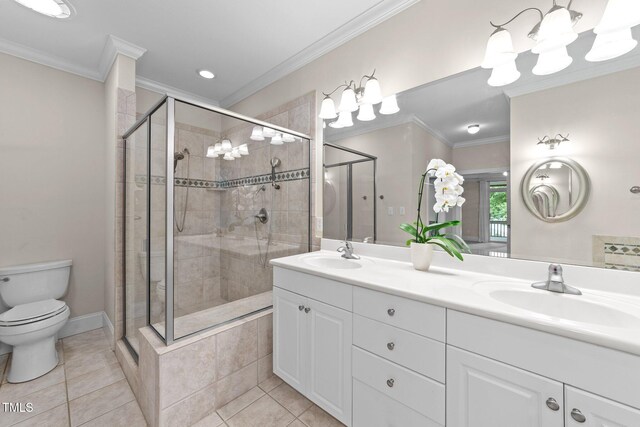 1221 Sagamore Dr, Louisburg, NC 27549 - bathroom with double vanity, a shower stall, ornamental molding, tile patterned floors, and recessed lighting