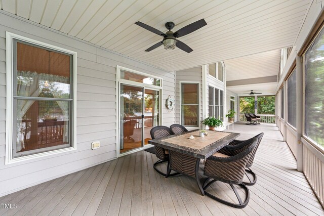 1221 Sagamore Dr, Louisburg, NC 27549 - sunroom / solarium with ceiling fan and outdoor dining space