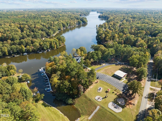 1221 Sagamore Dr, Louisburg, NC 27549 - aerial view of property and surrounding area with a large body of water and a forest