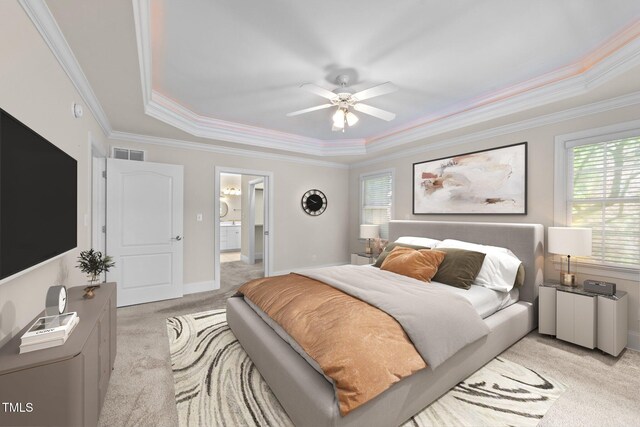 1221 Sagamore Dr, Louisburg, NC 27549 - bedroom featuring a raised ceiling, light colored carpet, ornamental molding, ensuite bath, and ceiling fan