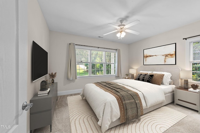 1221 Sagamore Dr, Louisburg, NC 27549 - bedroom featuring light carpet and ceiling fan