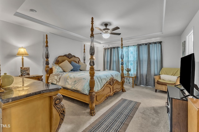 220 Garden Vine Trl, Raleigh, NC 27610 - bedroom featuring a raised ceiling, light carpet, and a ceiling fan