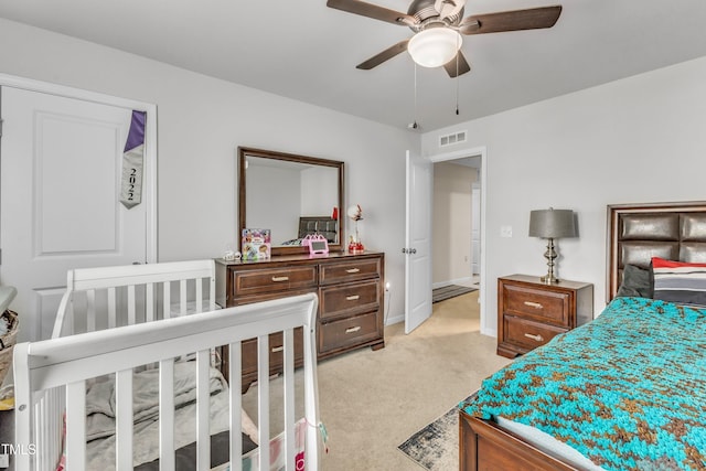 220 Garden Vine Trl, Raleigh, NC 27610 - bedroom featuring light colored carpet and ceiling fan