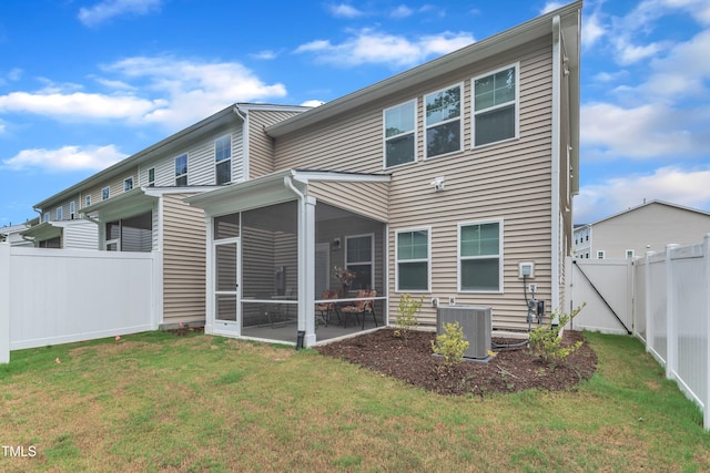 220 Garden Vine Trl, Raleigh, NC 27610 - rear view of property featuring a sunroom and a fenced backyard