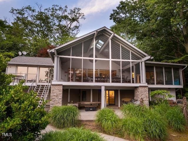 64 Robin Rd, Semora, NC 27343 - back of property with a sunroom